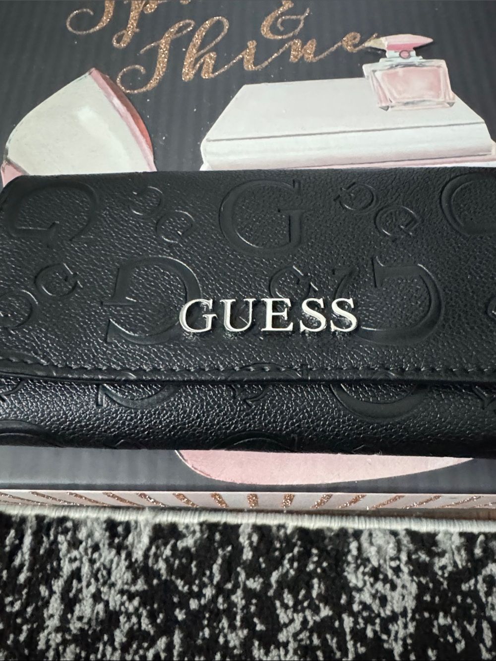 GUESS Black Embossed Logo Foldover Wallet with Silver Lettering